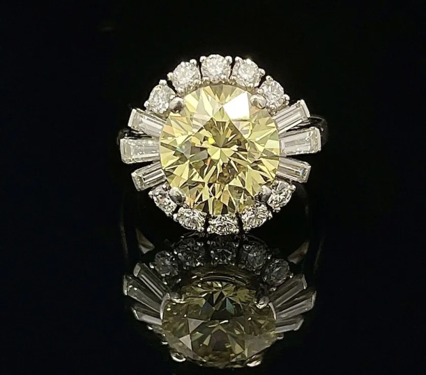Vintage Fancy Intense Yellow Diamond Ring in Platinum